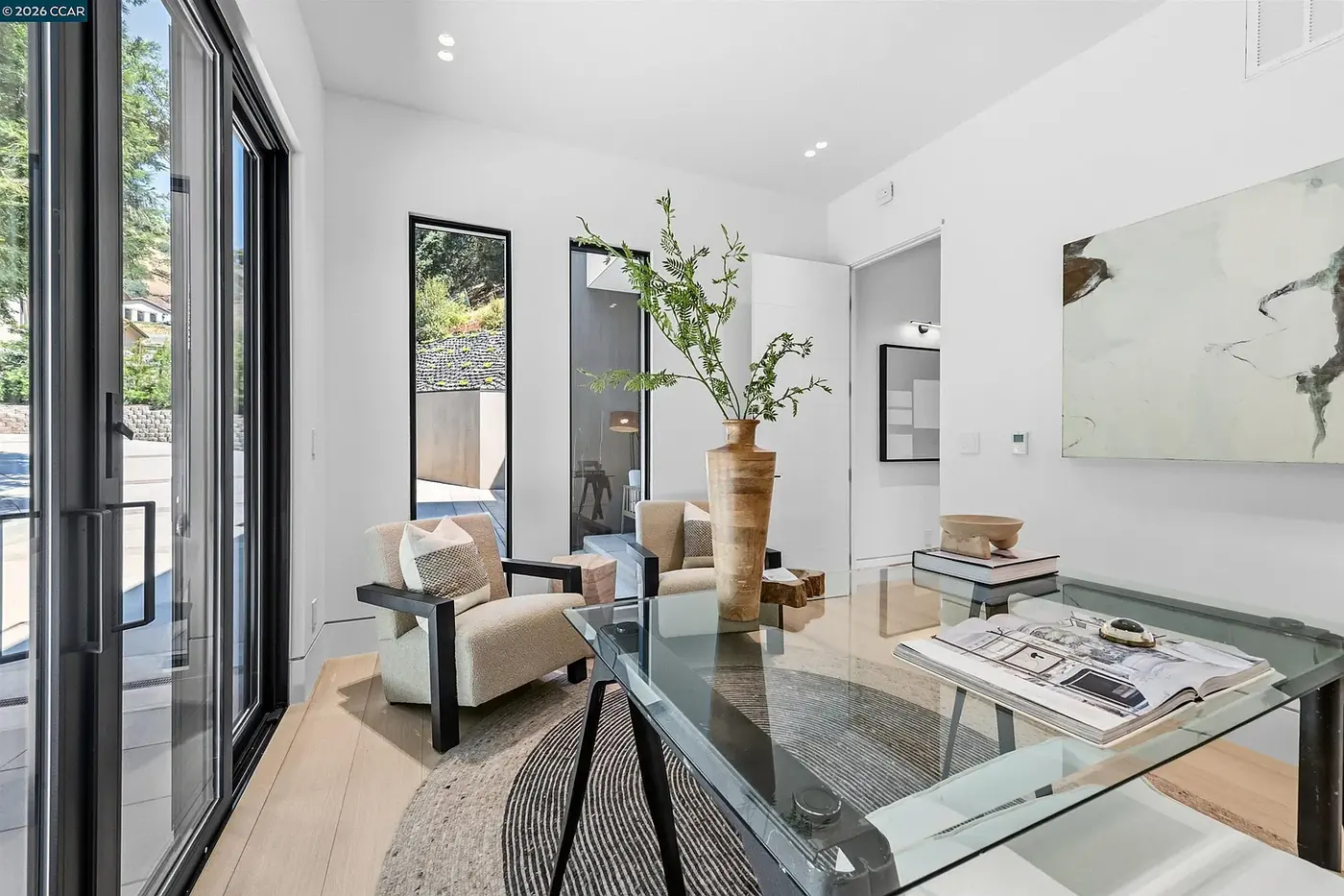 Sitting area beside sliding doors to the terrace
